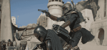 Boba Fett and the Mandalorian fight side by side