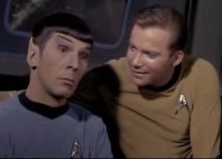 Captain Kirk with his arm around Mr. Spock in &quot;Star Trek&quot;