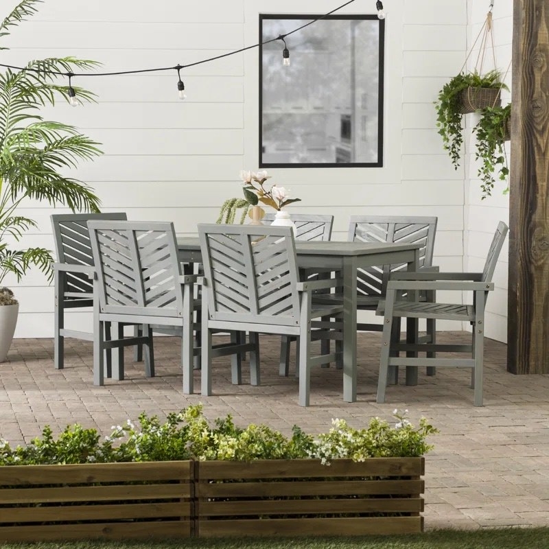 a gray wash six-piece dining set in a patio