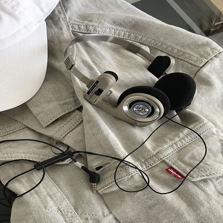 a person's headphones on a jacket