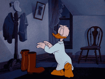 A cartoon duck putting a boot on his head