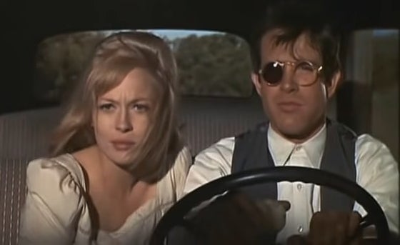 Bonnie and Clyde riding in a car together in &quot;Bonnie and Clyde&quot;