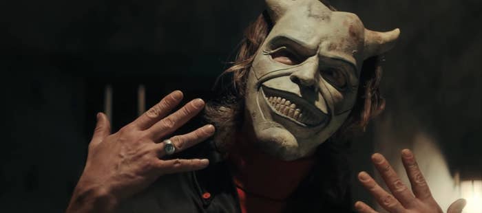 The Grabber wearing a smiling devil mask in &quot;The Black Phone&quot;