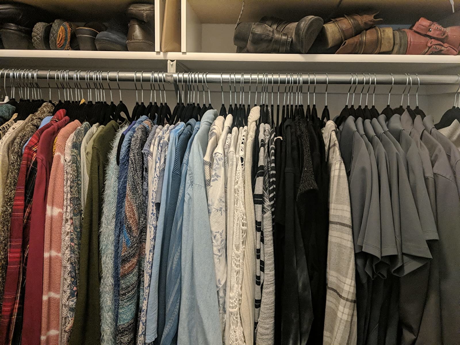 Reviewer image of black hangers used in closet