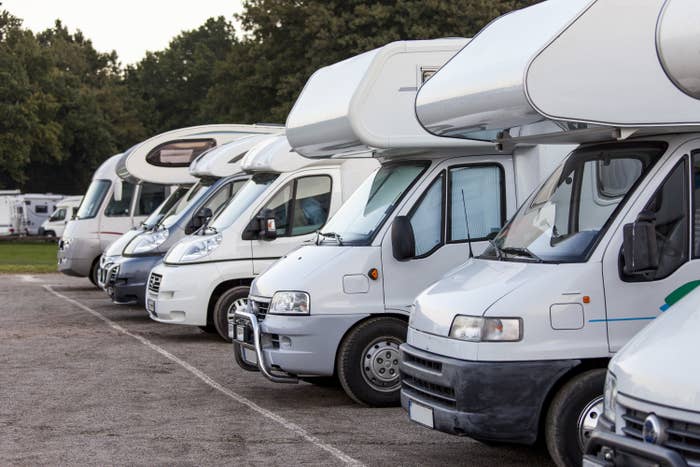 row of RVs parked together