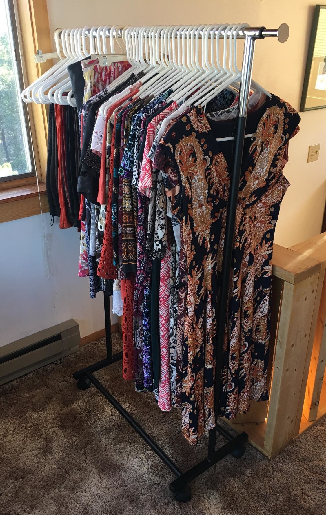 Reviewer image of clothes hanging on rolling rack