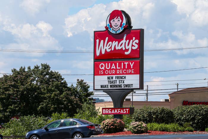 Wendy&#x27;s store sign saying &quot;Quality is our recipe&quot; and advertising new French toast