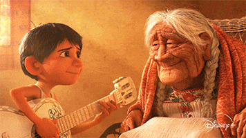 Miguel playing the guitar to Mamá Coco in &quot;Coco&quot;