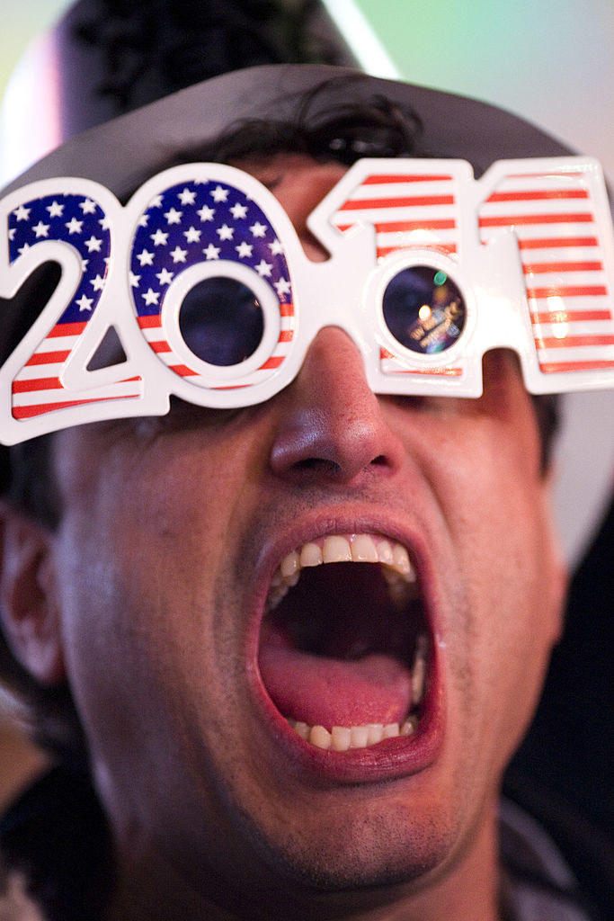 Person wearing 2011 New Year&#x27;s glasses