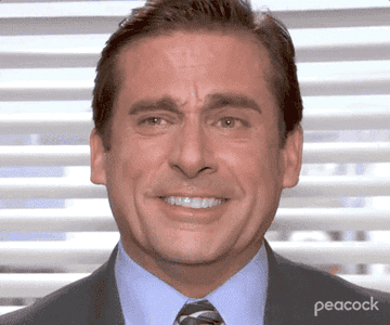 michael scott from &quot;The office&quot; laughing