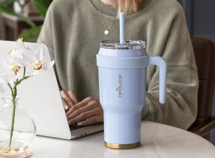 a photo of the insulated tumbler in the color periwinkle