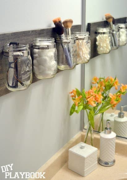 mason jars holding bathroom items