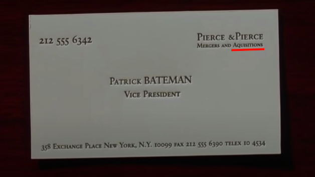 the business card with the misspelled word underlined