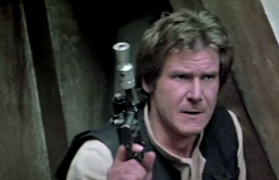 Han Solo holding a weapon