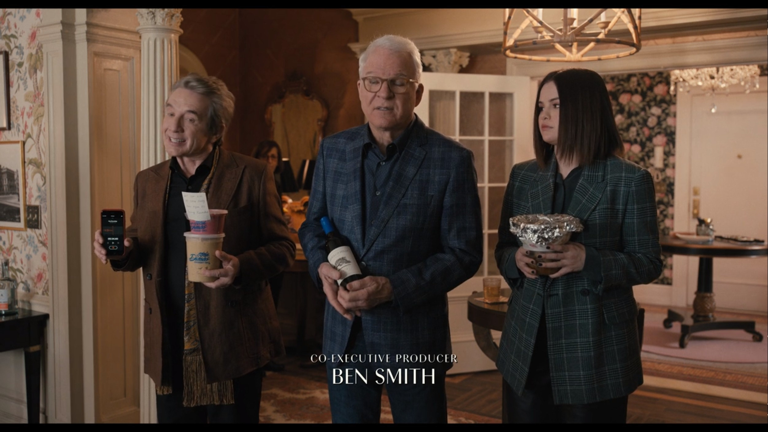 Mabel standing with Oliver and Charles