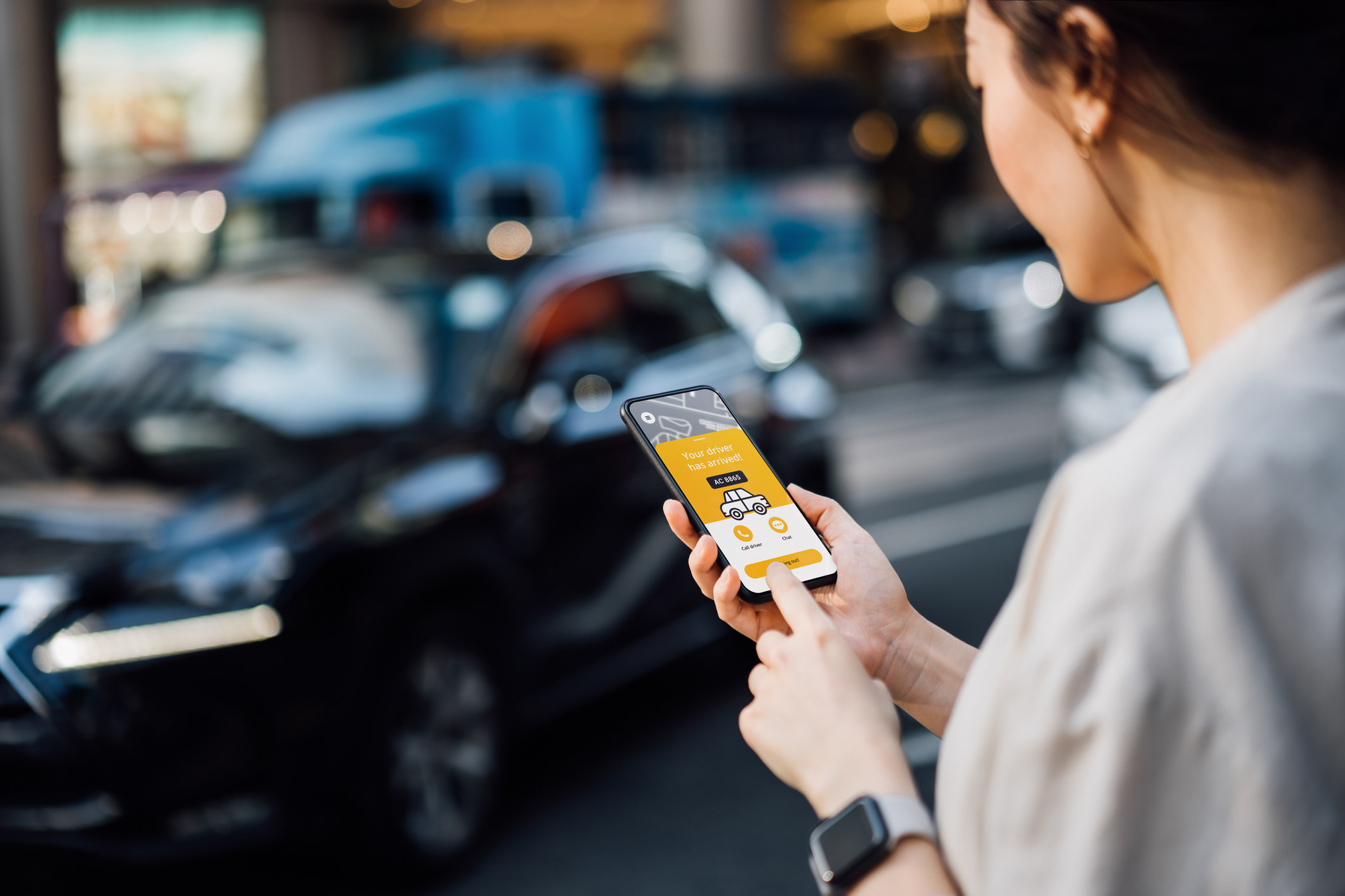 a woman using a ride share app