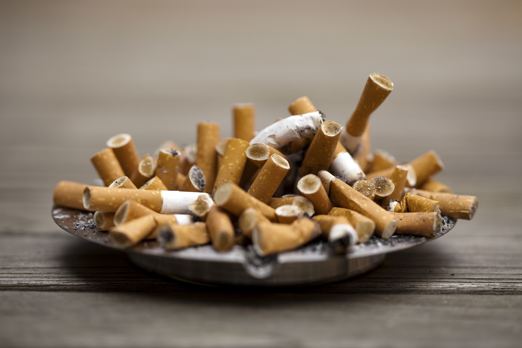 An ashtray full of cigarettes