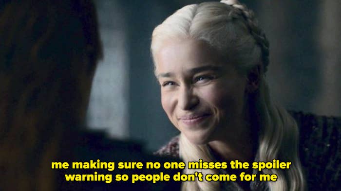 Daenerys with a funny expression on her face; there is text saying me making sure no one misses the spoiler warning so people don't come for me