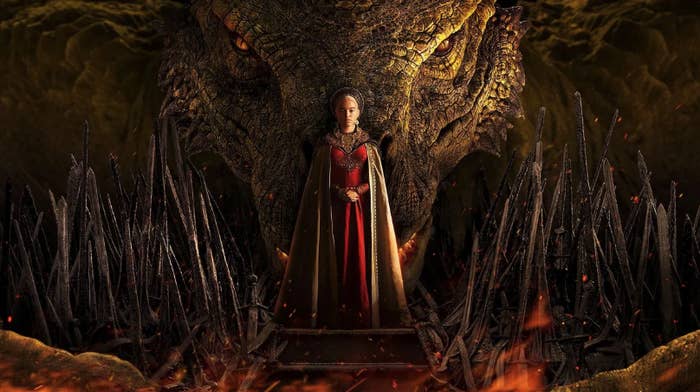 Rhaenyra Targaryen standing in front of a dragon