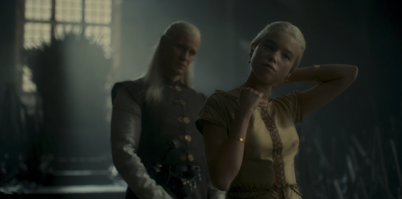 Rhaenyra moving her hair back so Daemon can put the necklace on her