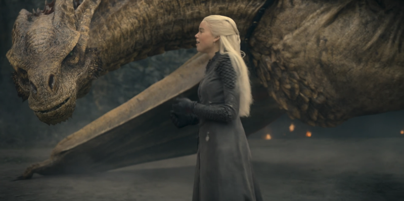 Rhaenyra standing next to her dragon