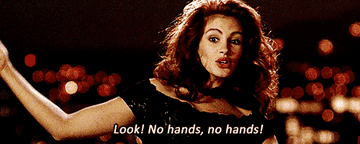 Julia Roberts as Vivian Ward in &quot;Pretty Woman&quot; saying &quot;Look, no hands&quot;