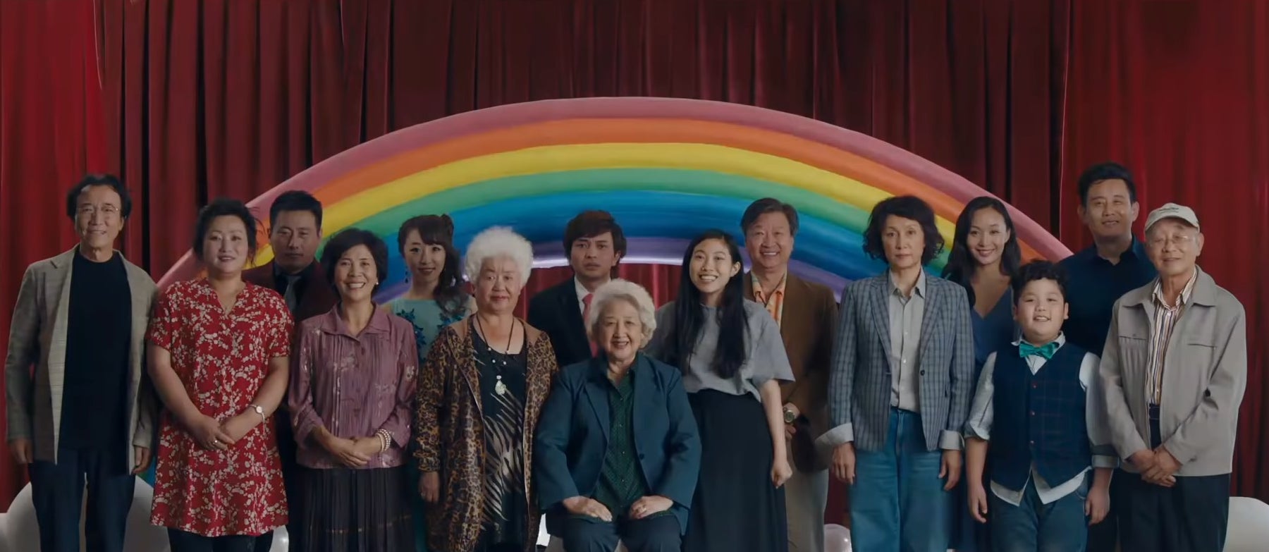 Nai Nai and her family posing for a family photo in &quot;The Farewell&quot;