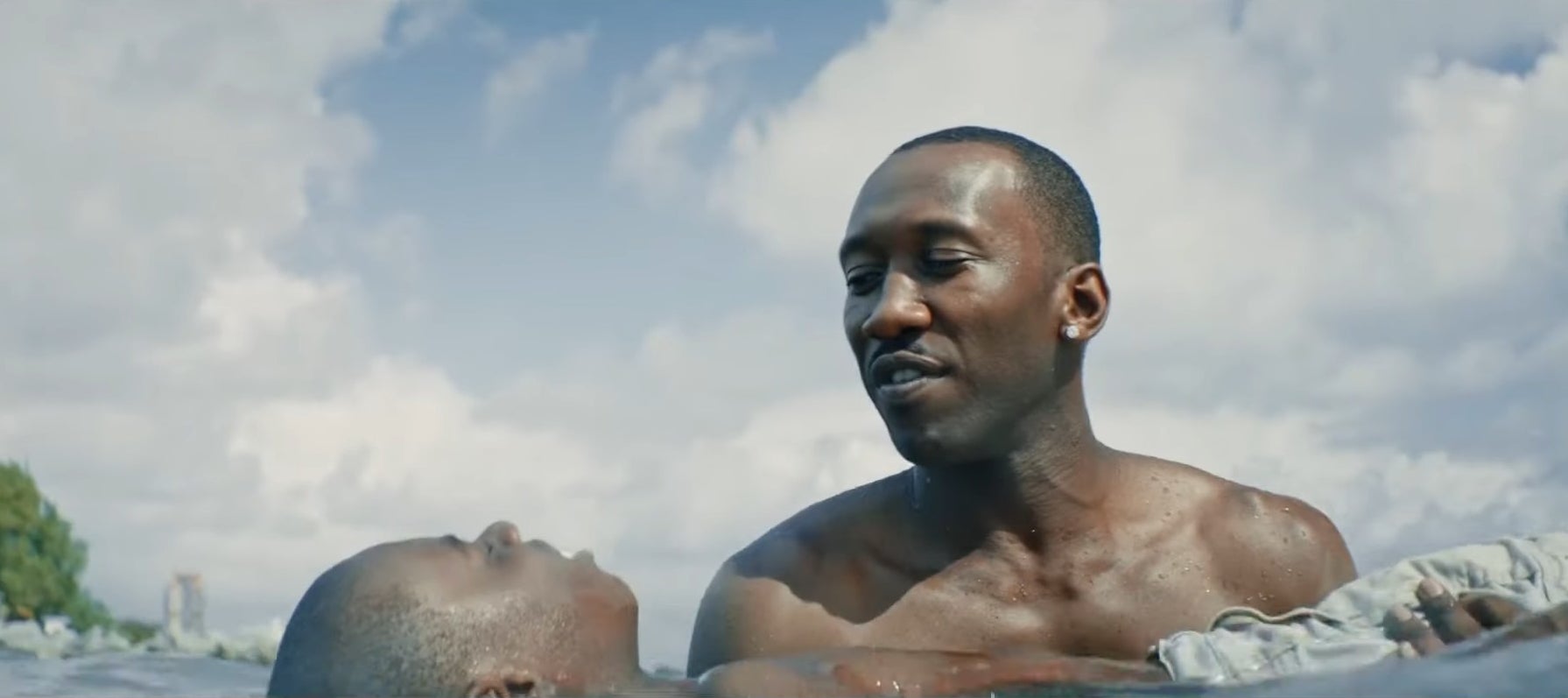 Juan holding Chiron up in the water in &quot;Moonlight&quot;