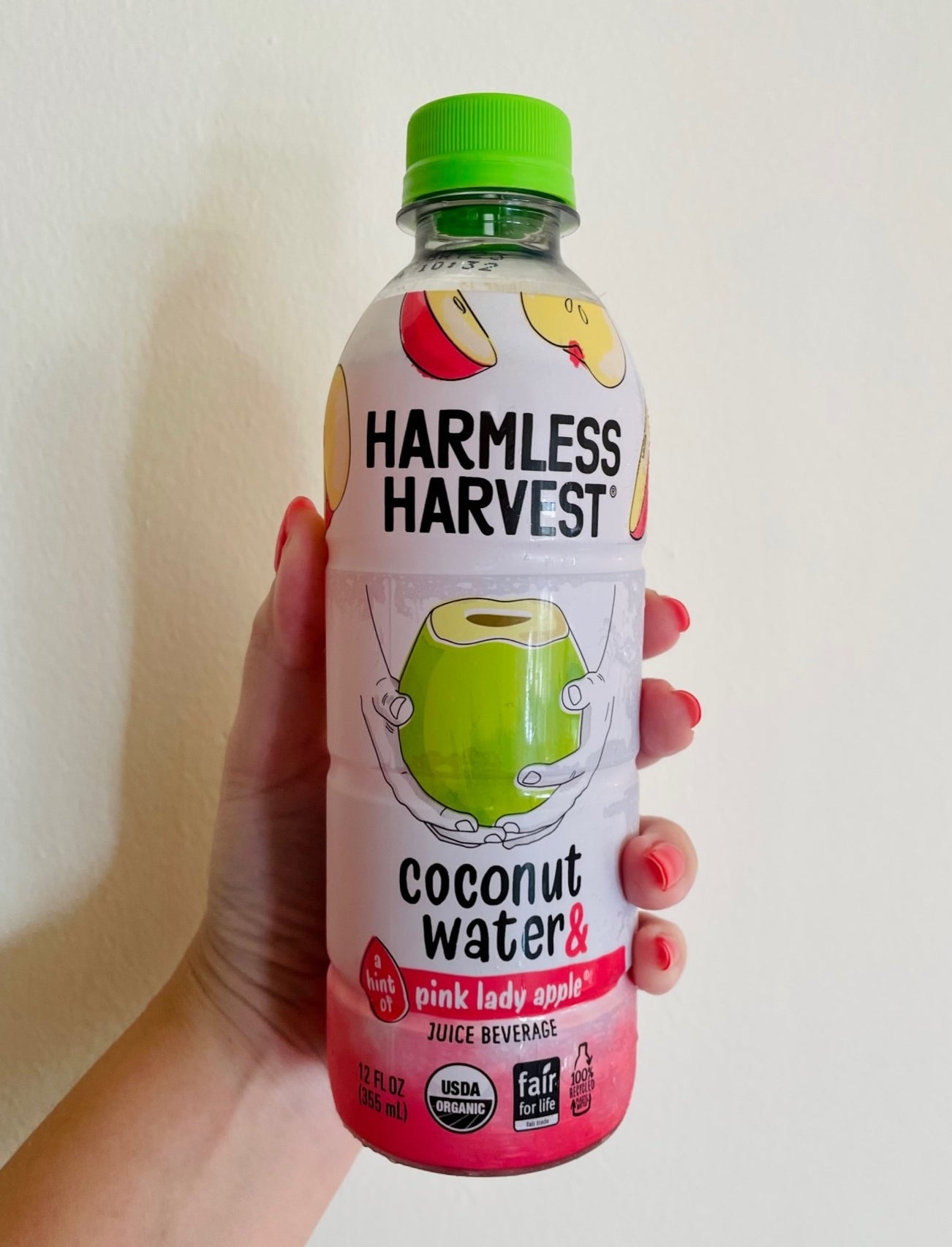 A bottle of the coconut water and apple juice beverage