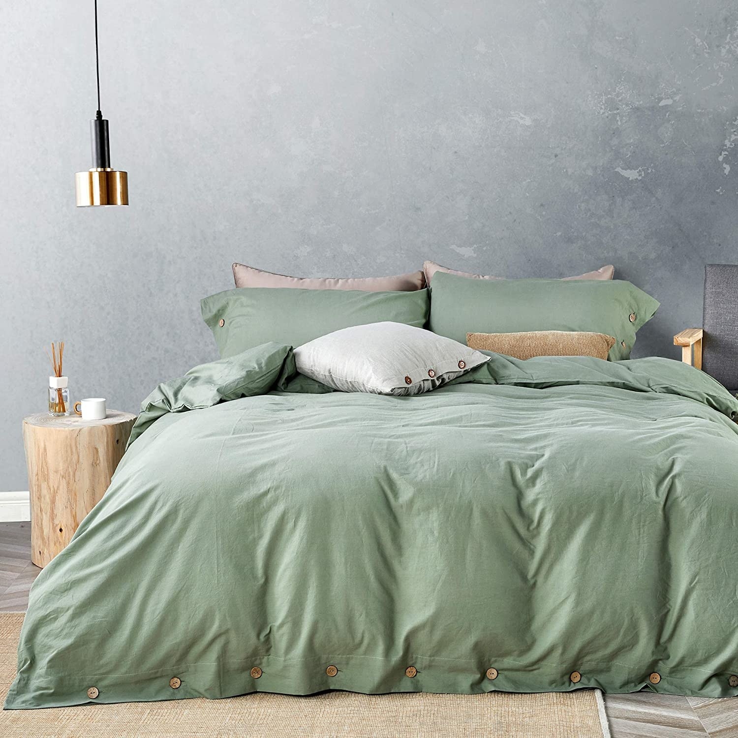 a bed made up with the washed cotton duvet cover