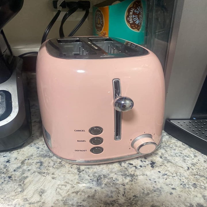 reviewer photo of the toaster in pink