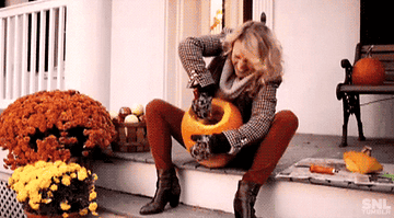 A woman from &quot;SNL&quot; aggressively carving pumpkins