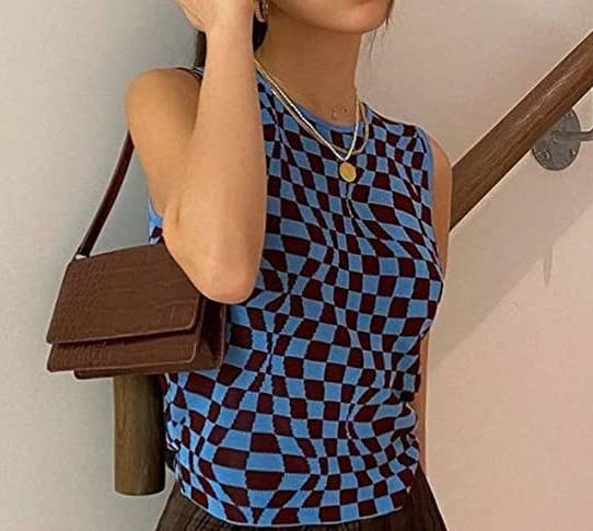 a person wearing the patterned vest