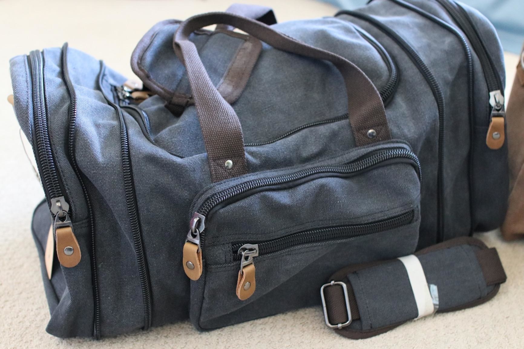 Reviewer&#x27;s photo of the duffel in the color Dark Grey