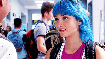 A girl with blue hair nodding