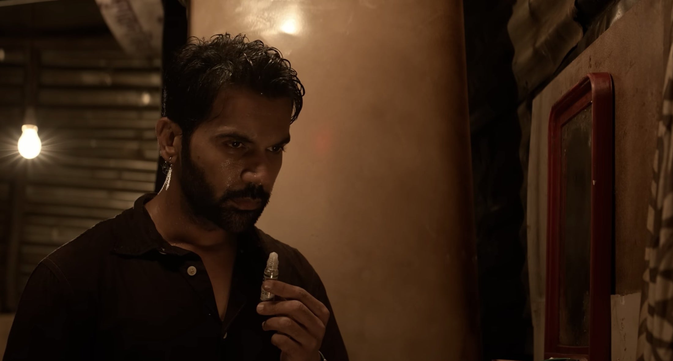 Rajkummar Rao smelling a perfume