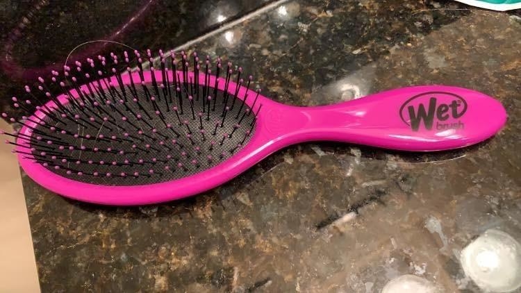 Reviewer image of pink hair brush