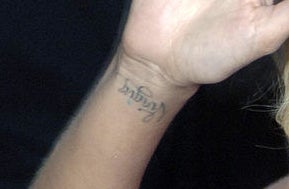 A close-up of the tat, which appears upside down