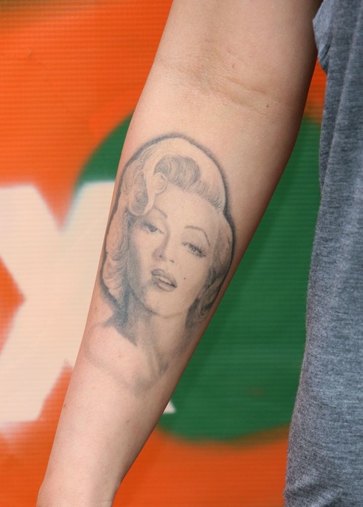 Marilyn&#x27;s face on the inside of her arm below her elbow