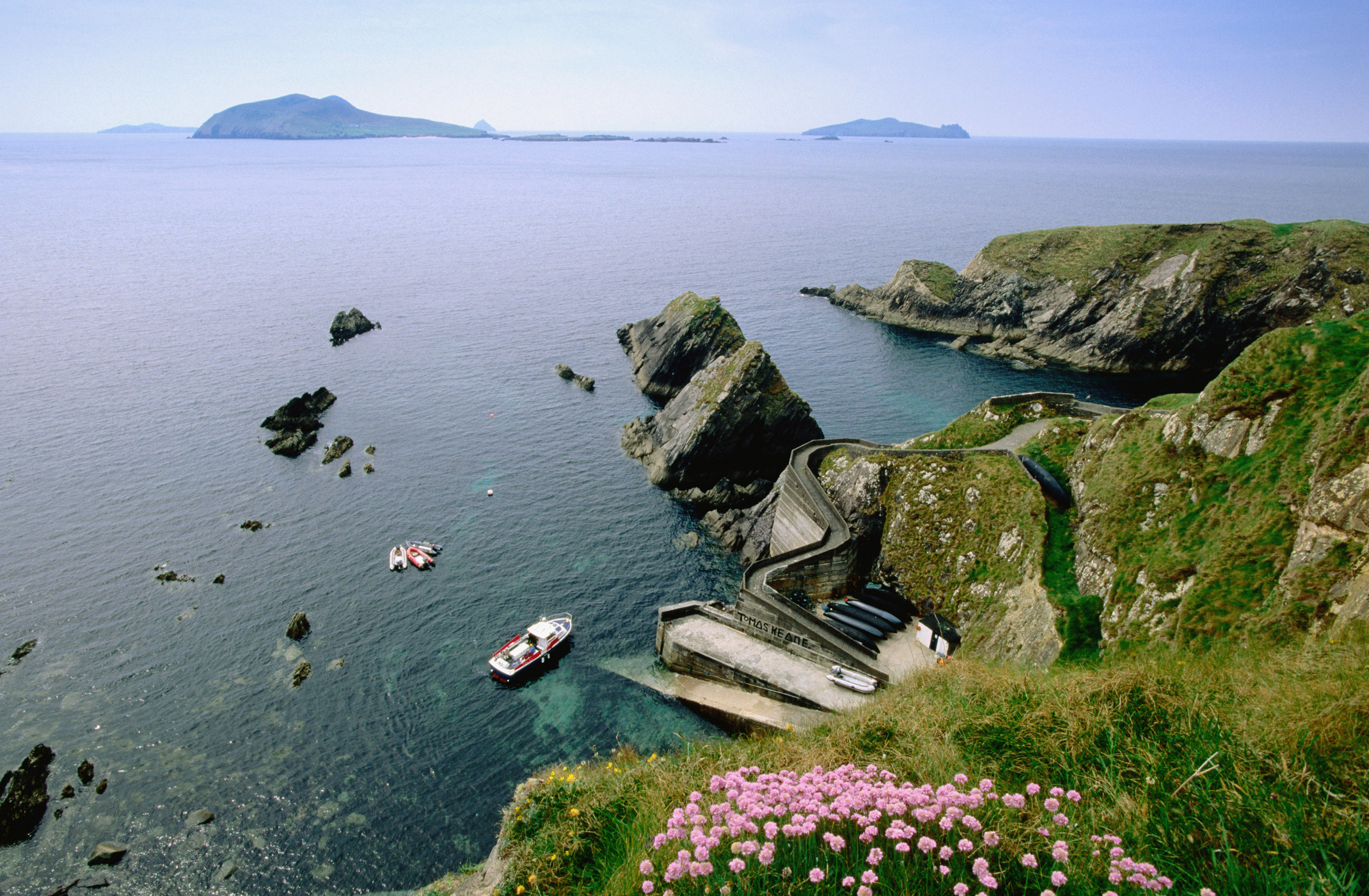 Cliffs over a harbor in the Dingle Peninsula.