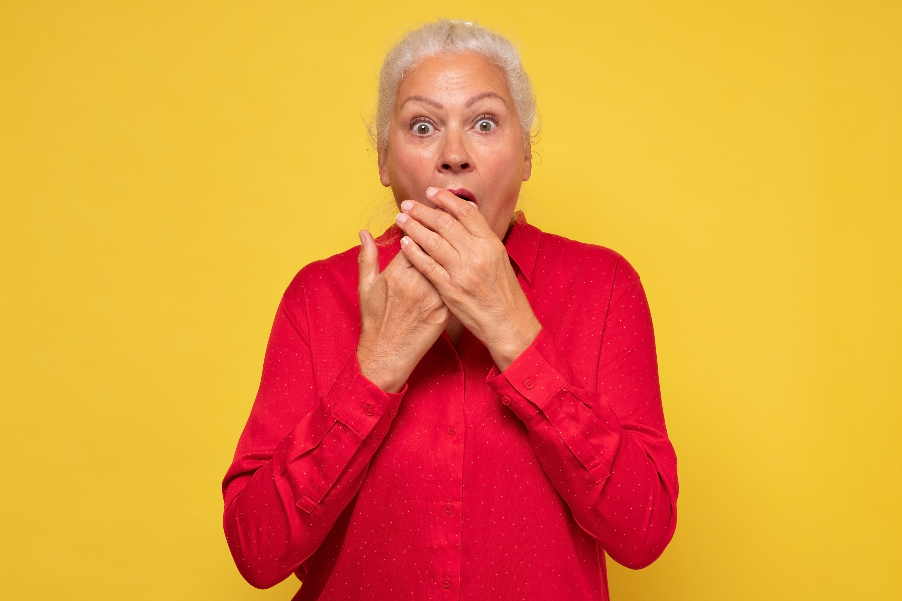 An older woman with a shocked look