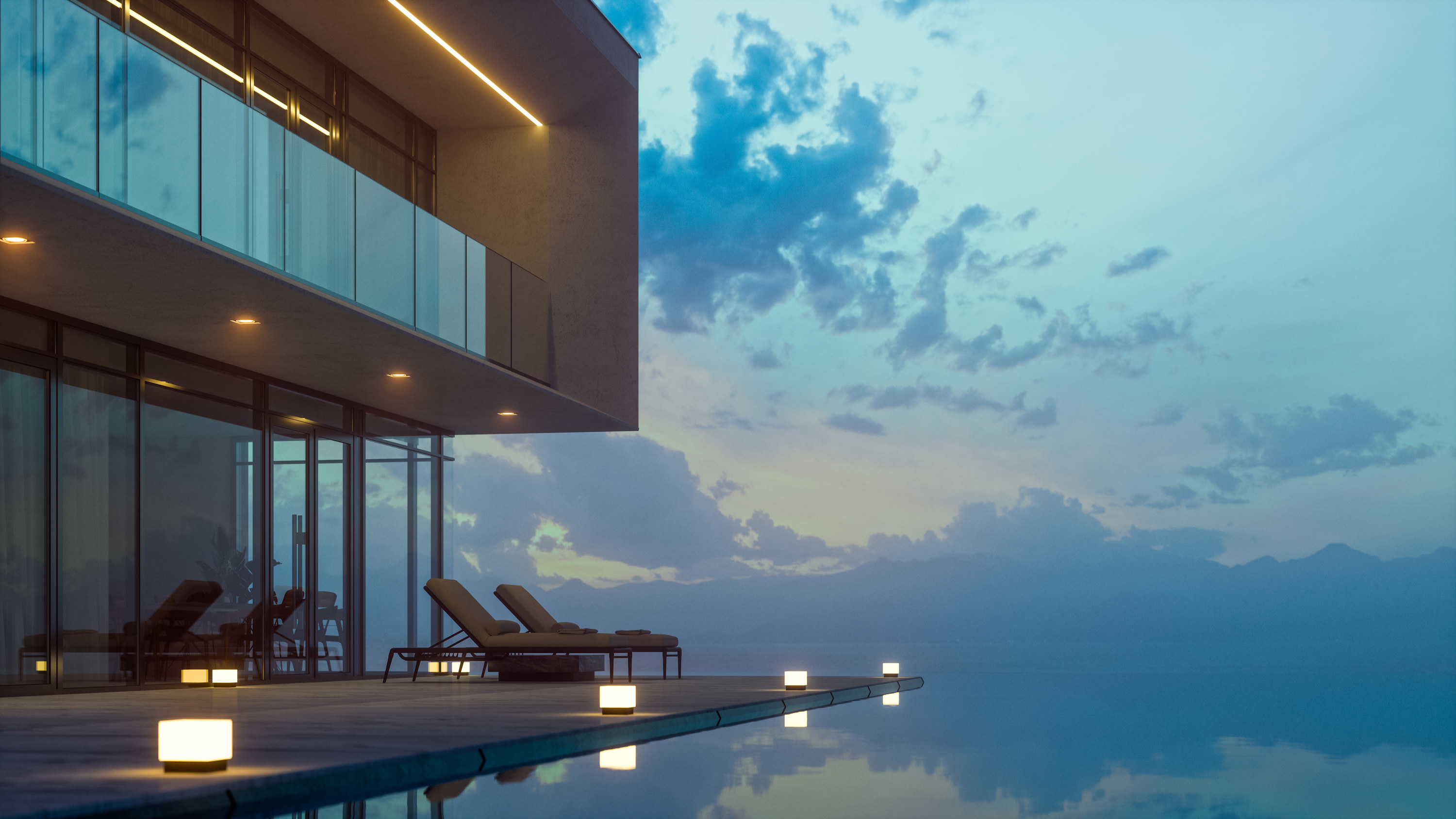 Luxurious villa with private infinity pool and chaise lounges at summer in dusk.