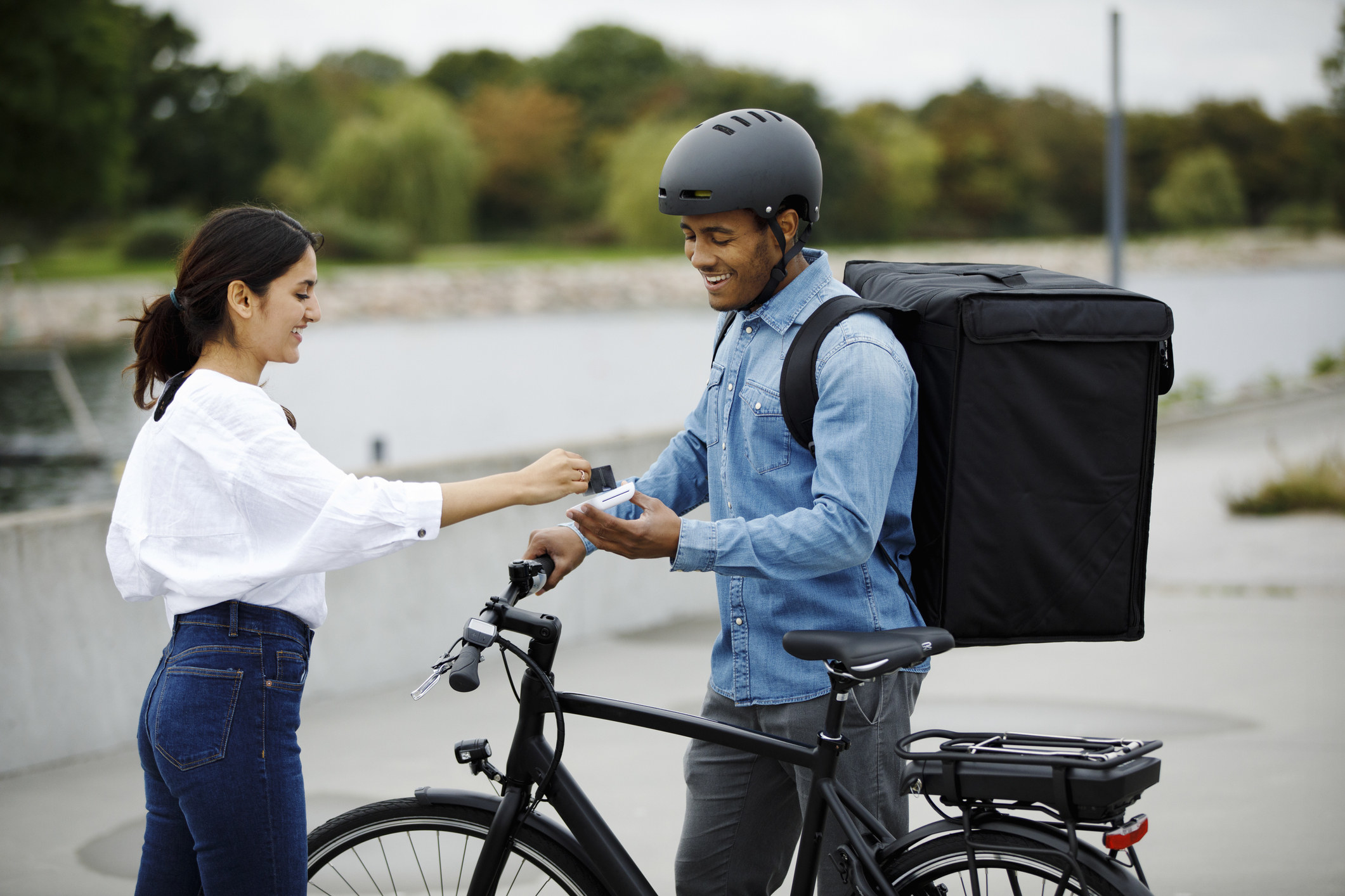 someone on a bike deliver uber eats