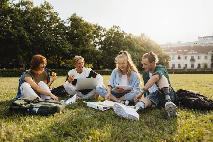 group of students studying outside