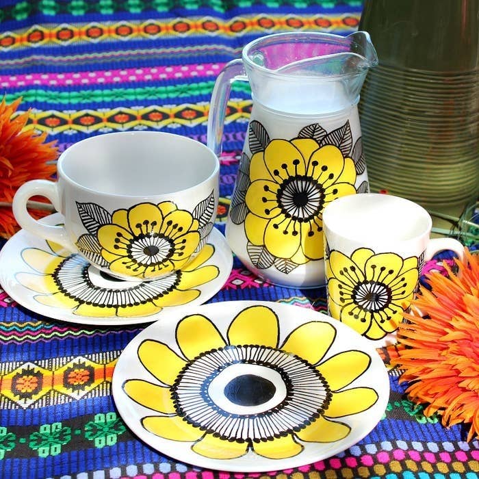 flowers drawn on plates and cups