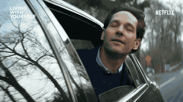 Paul Rudd as Miles Elliot with his head out the window in &quot;Living With Yourself&quot;