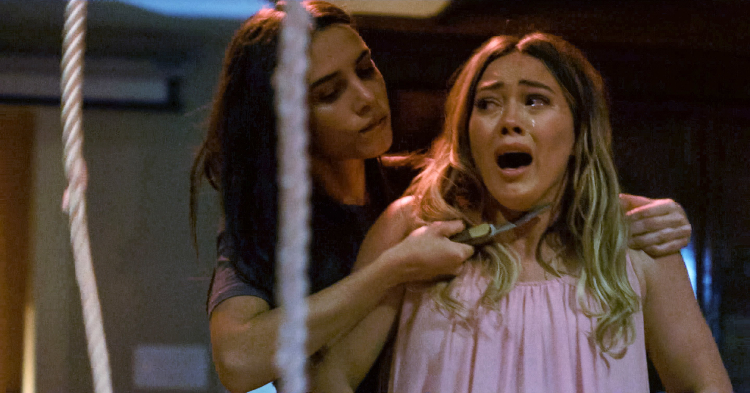 Hilary Duff&#x27;s character being held with a knife at her throat