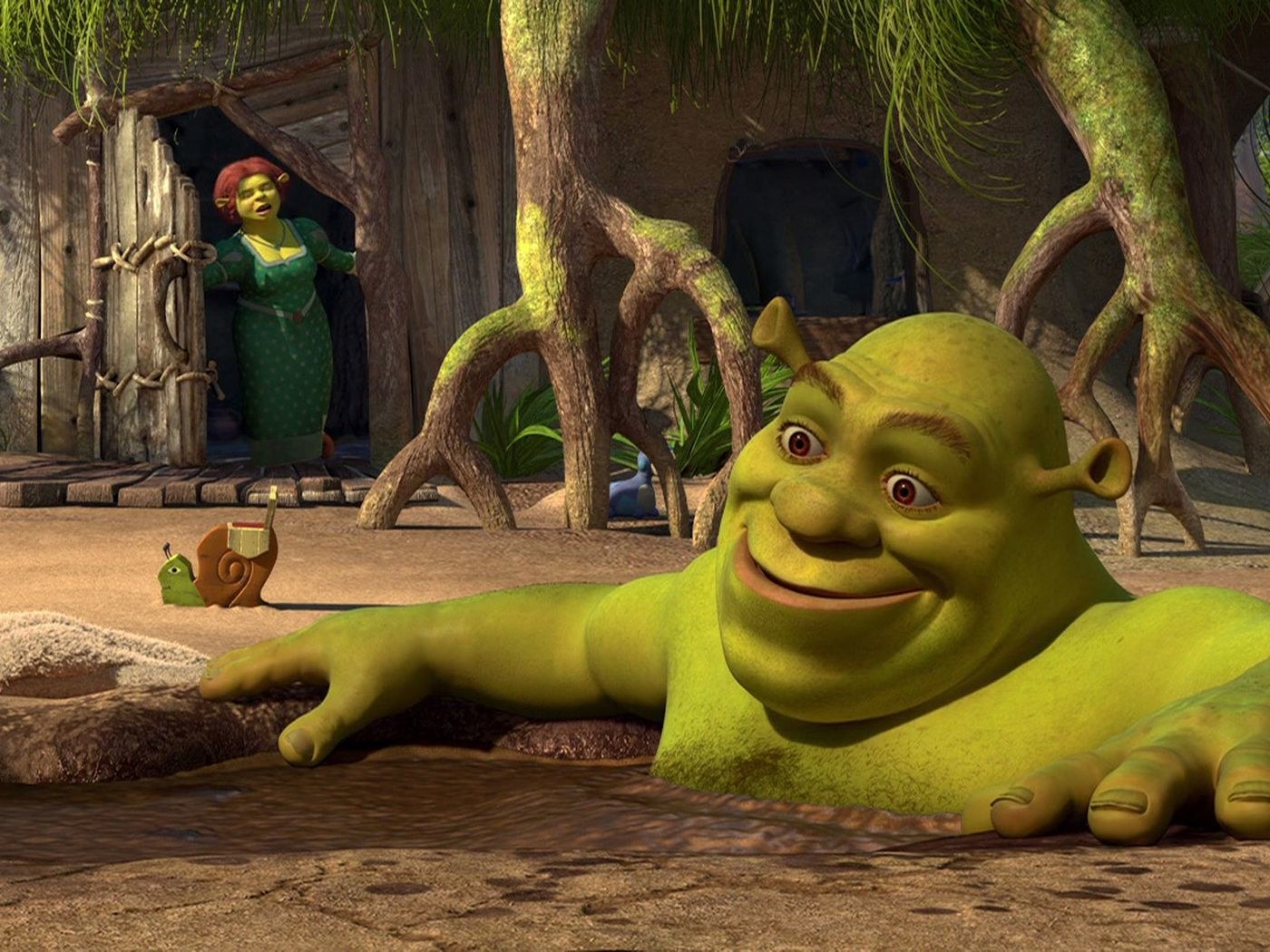 Shrek sitting in a muddy swamp like he&#x27;s taking a bath