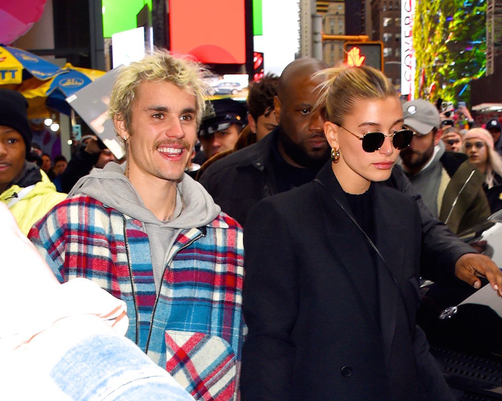 justin and hailey leaving an event