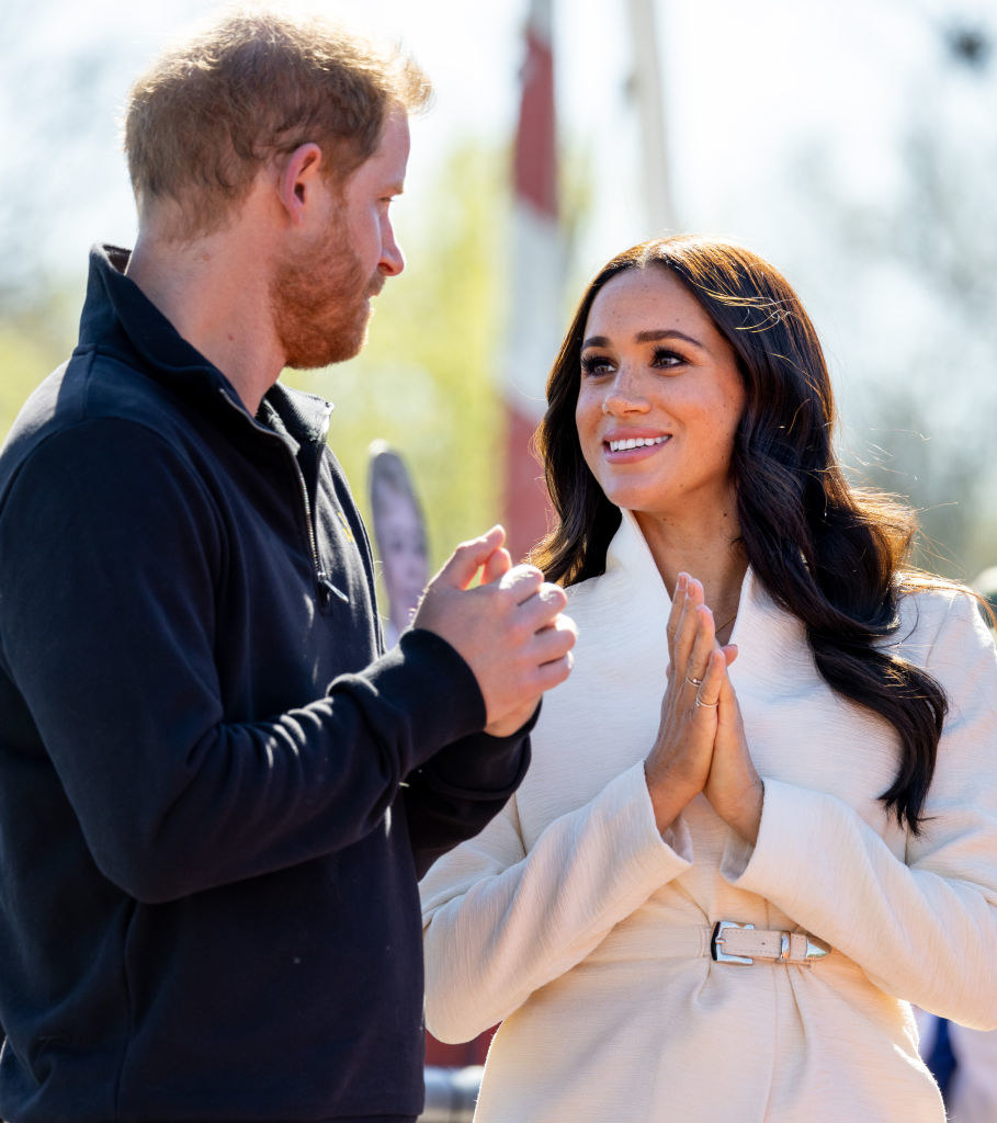 Meghan and Harry talking to each other